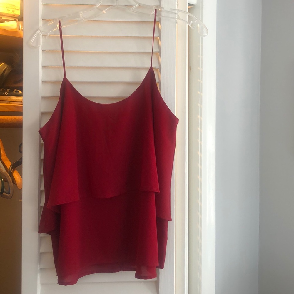 Red tank. Sheer material.
